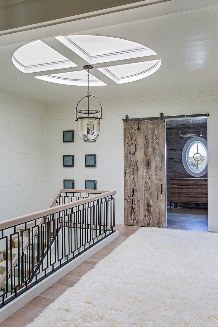 Oval Skylight and Reclaimed Wood Sliding Barn door