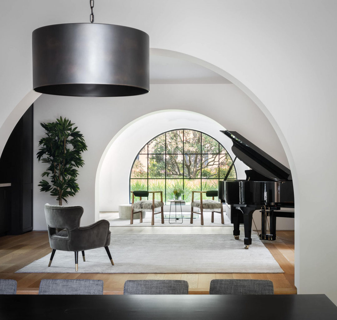 Living Room with Large Arched Window