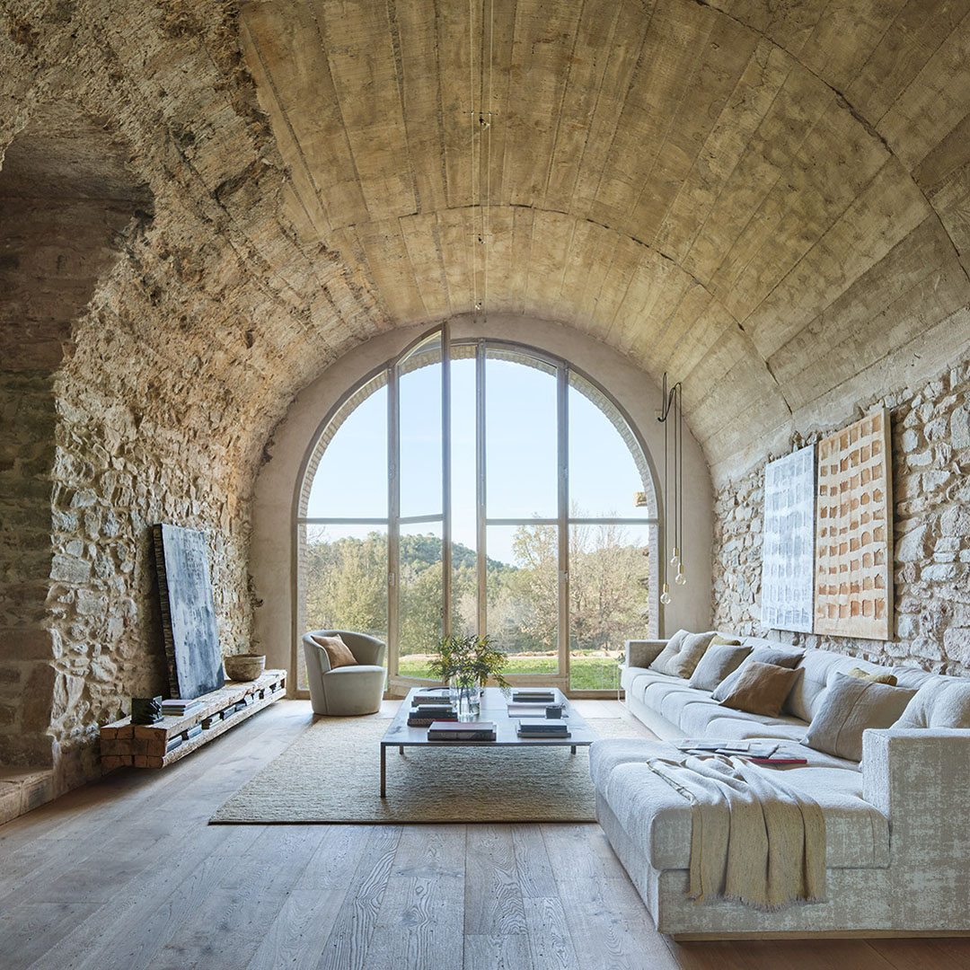 Stone House Interior with Arch Roof and Windows