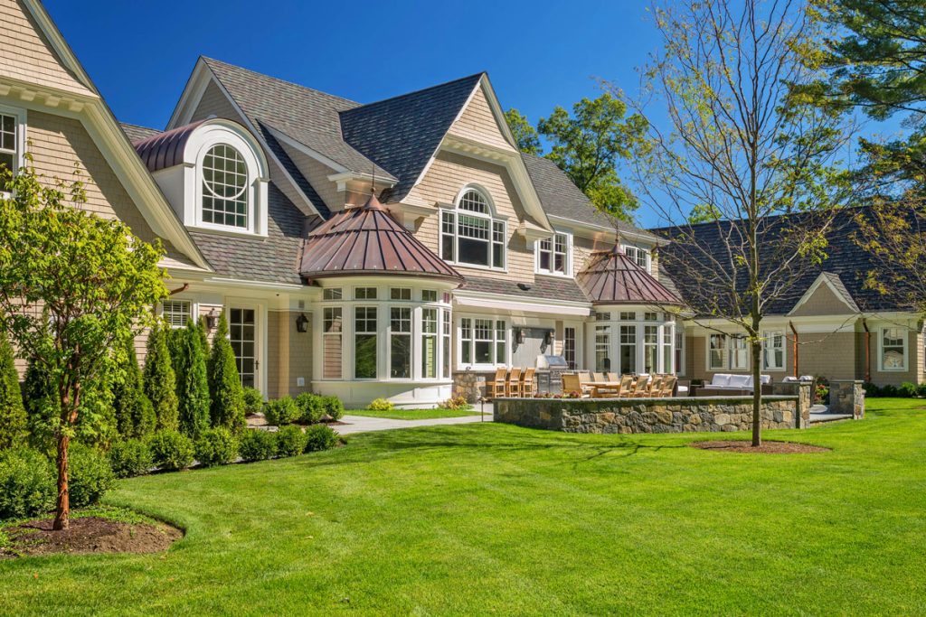Classic Shingle and Stone House with Traditional Architecture