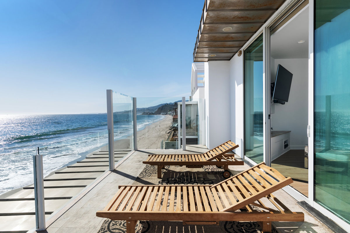 Inside Paris Hilton’s Malibu Beachfront Glass Mansion
