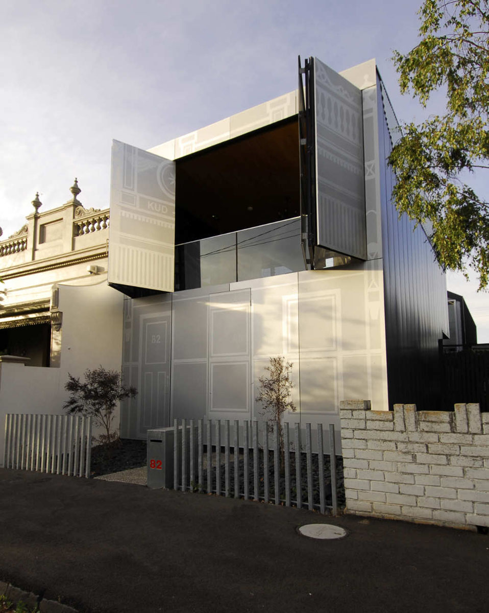 House with perforated steel screens