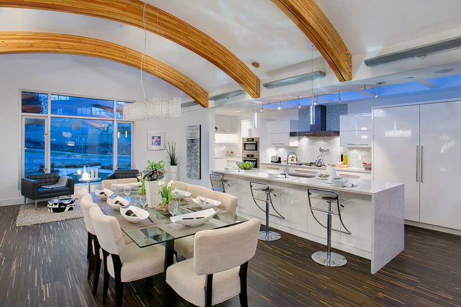 Contemporary Kitchen with Arced Ceiling Wood Beams