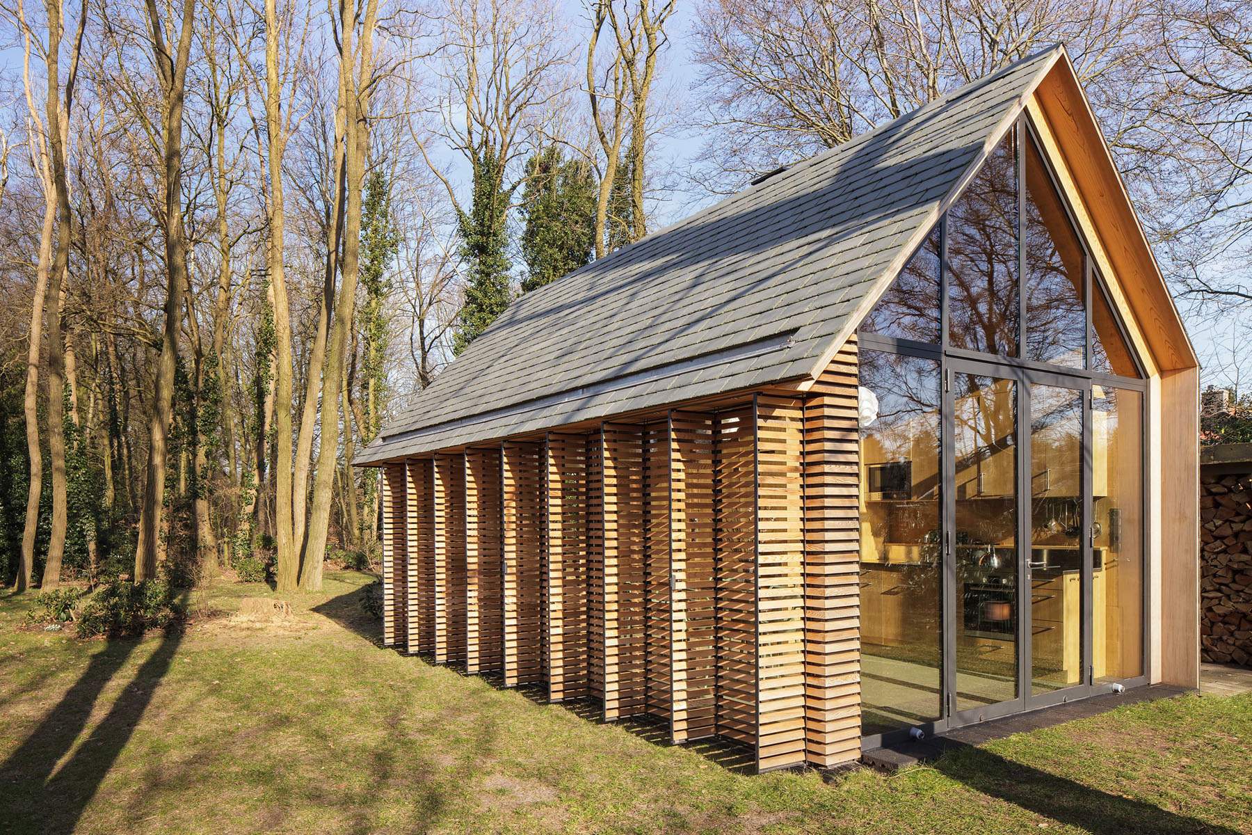Modern Small Country Cottage With Wooden Shutters In The Netherlands