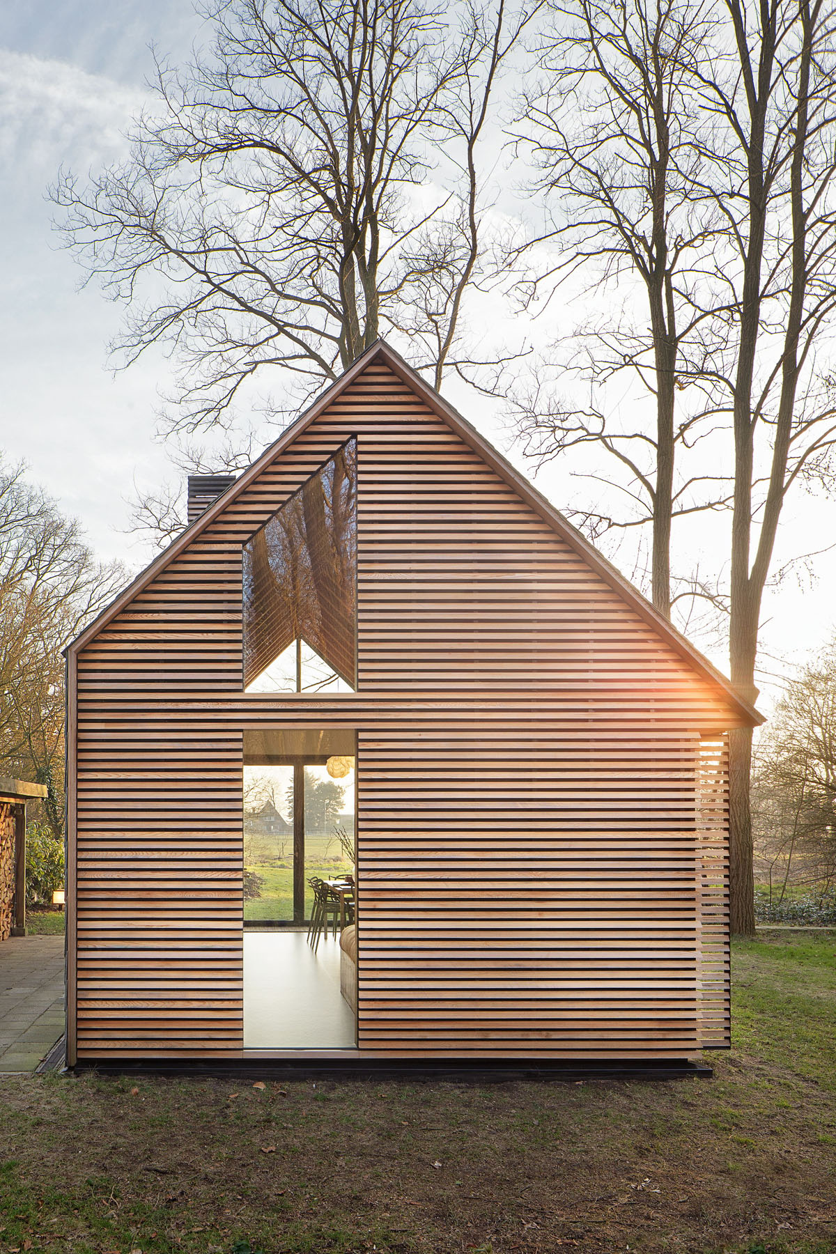 Modern Small Country Cottage With Wooden Shutters In The Netherlands
