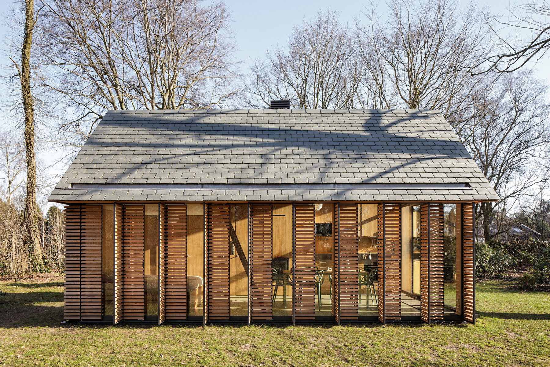 Wooden Country House with Shutters