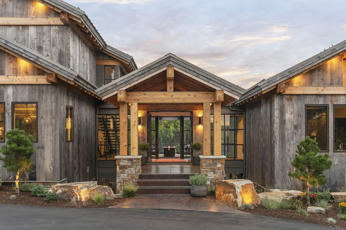 Modern Country Lodge Front Entrance with Glass and Metal Bridge