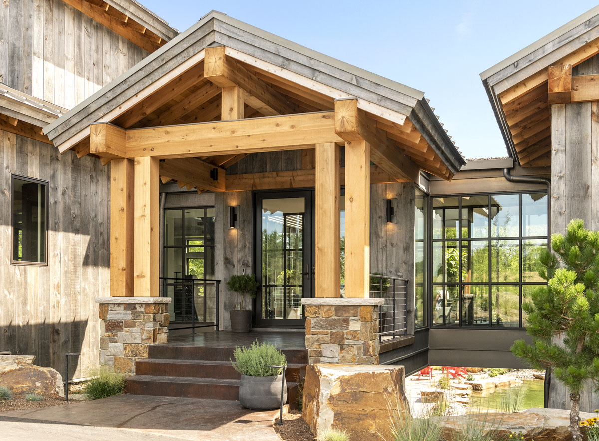 Modern Country Lodge Front Entrance with Glass and Metal Bridge