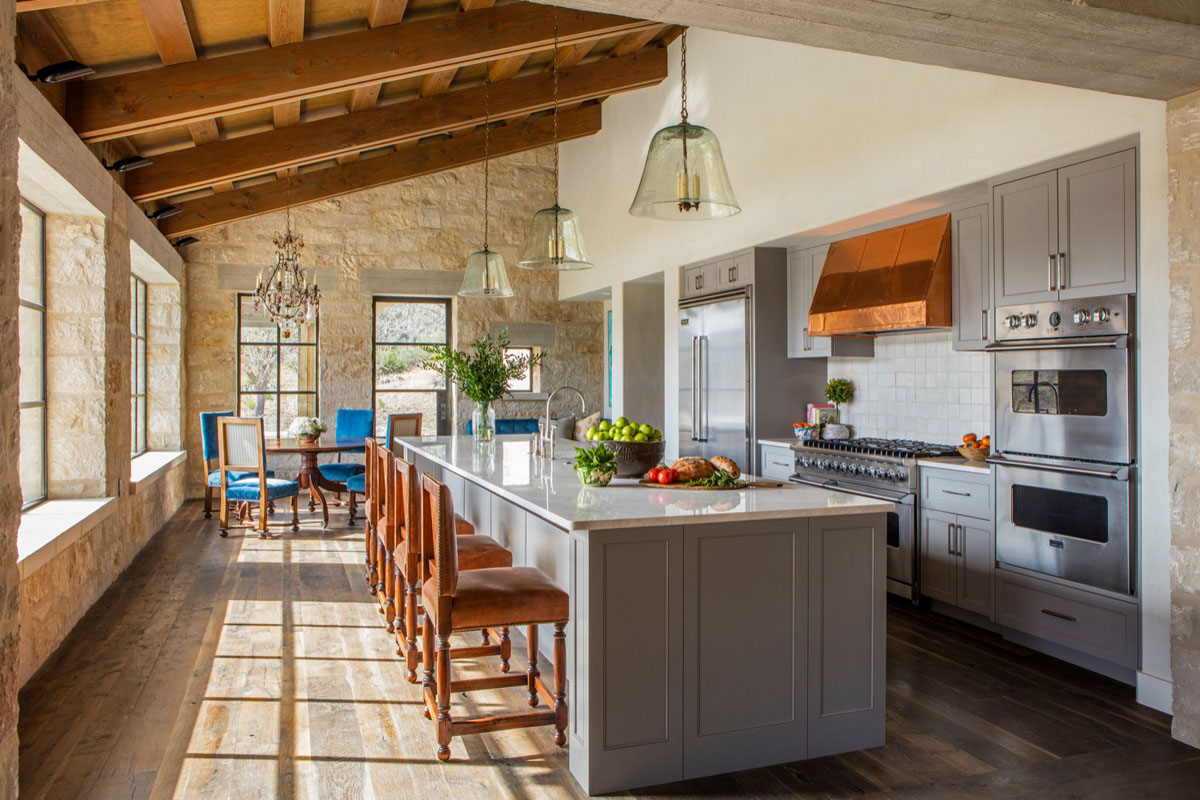 Transitional Style Kitchen with Rustic Stone Walls