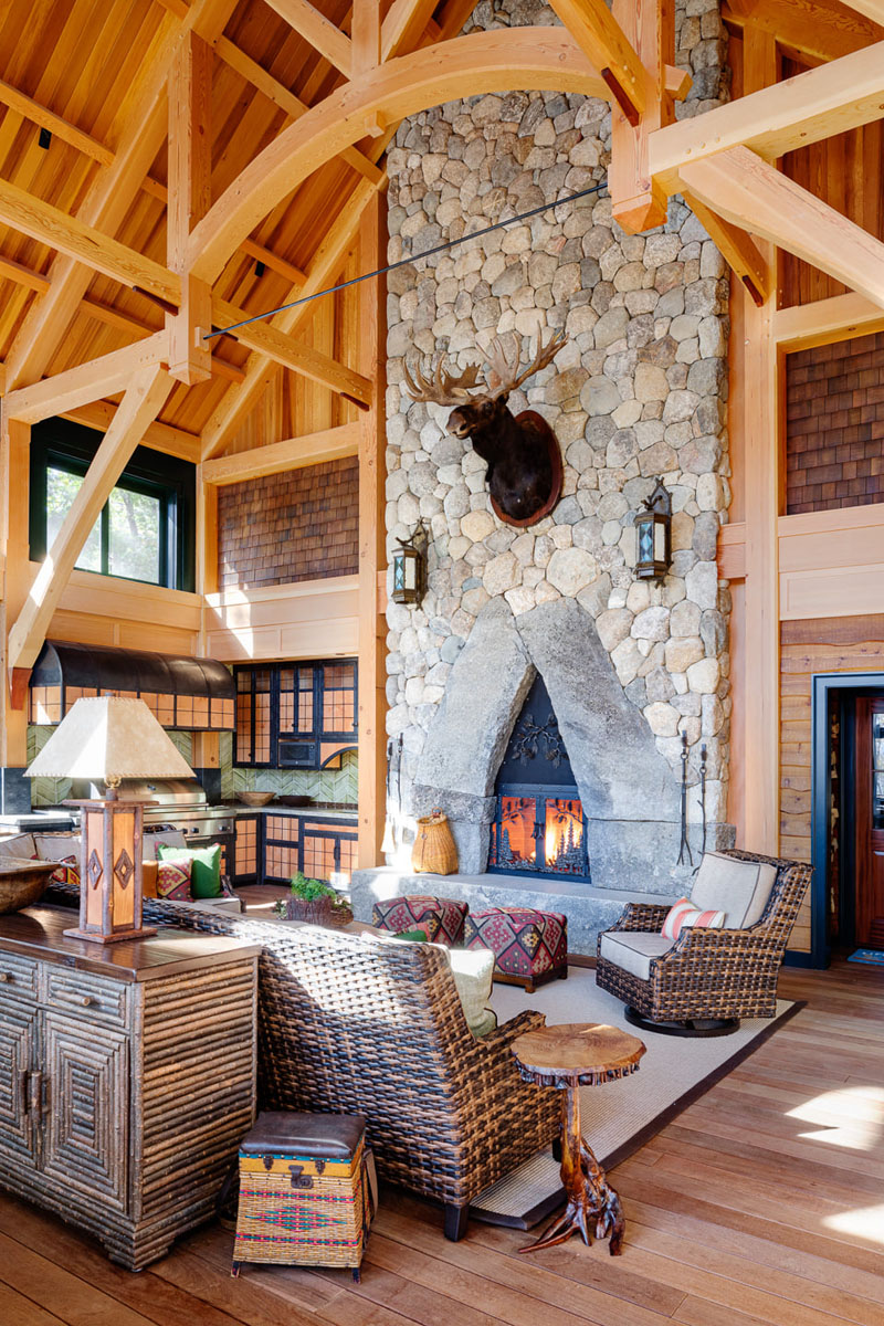 Rustic Timber Frame Living Room with Stone Fireplace