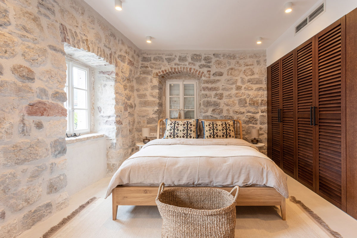 Rustic Bedroom with Stone Walls