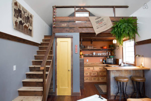 Charming Tiny House with Wood Flooring and Stairs