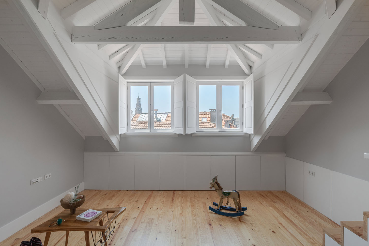 Modern Refurbished Attic Apartment with White Wood Beams
