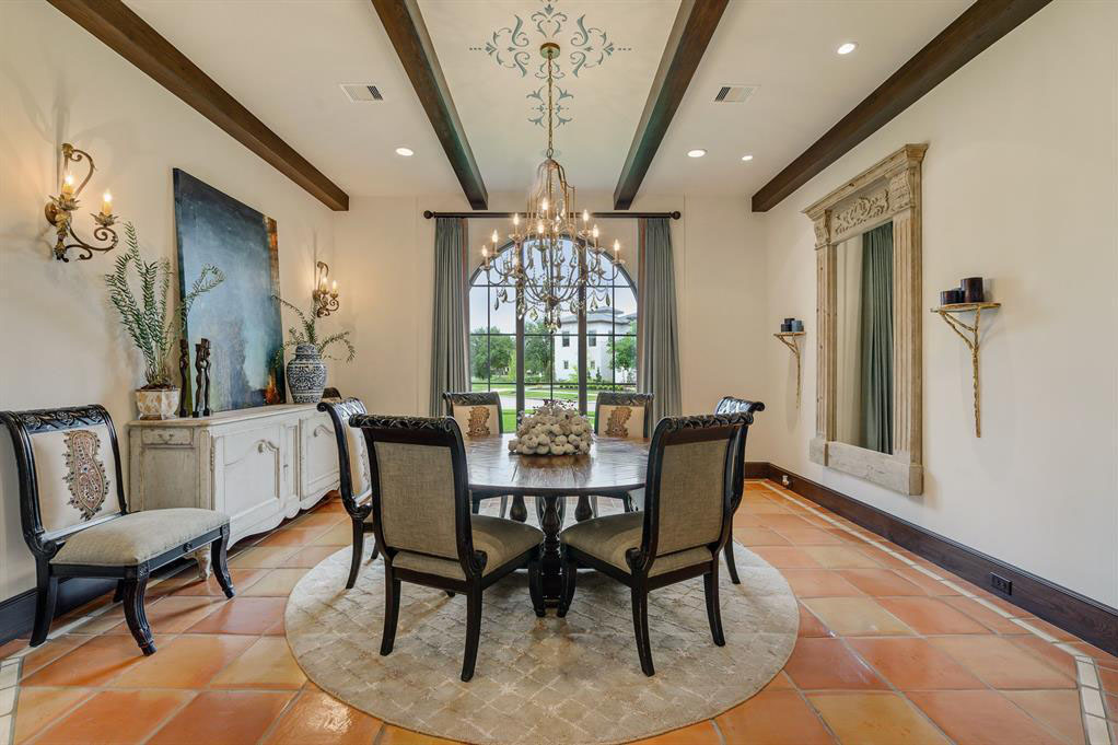 Spanish Style Dining Room with Wood Beams