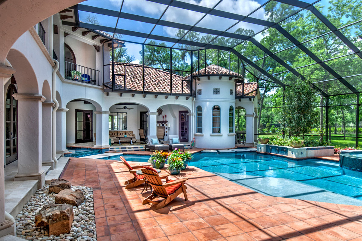 Spanish Colonial Home with Custom Pool Screen Enclosure