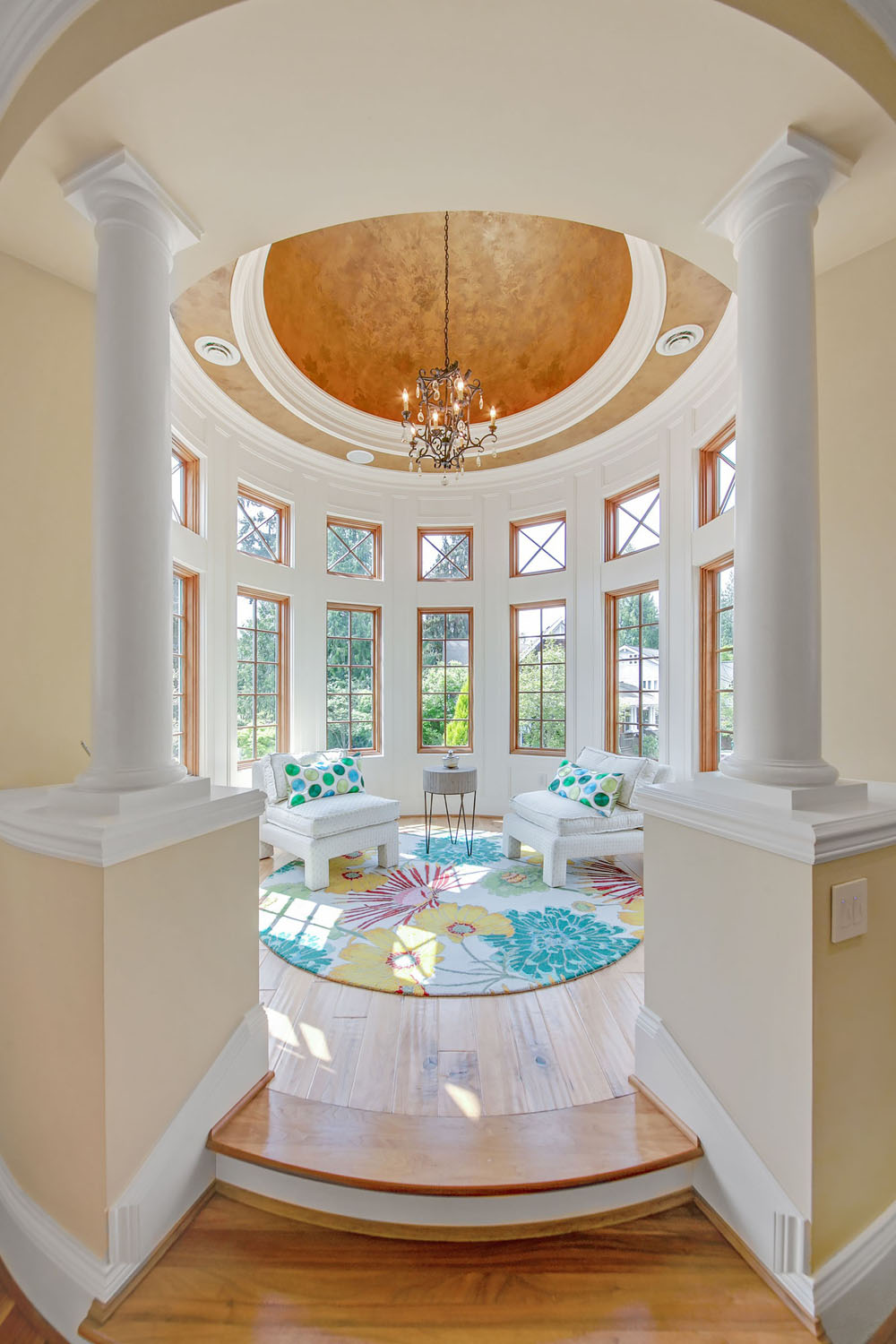 Round Sitting Nook with Decorative Columns and Dome Ceiling