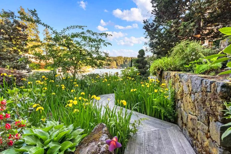 Lushly Landscaped Prime Waterfront Home on Oswego Lake