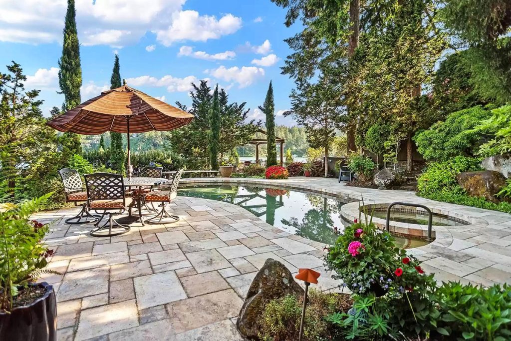 Lushly Landscaped Prime Waterfront Home on Oswego Lake