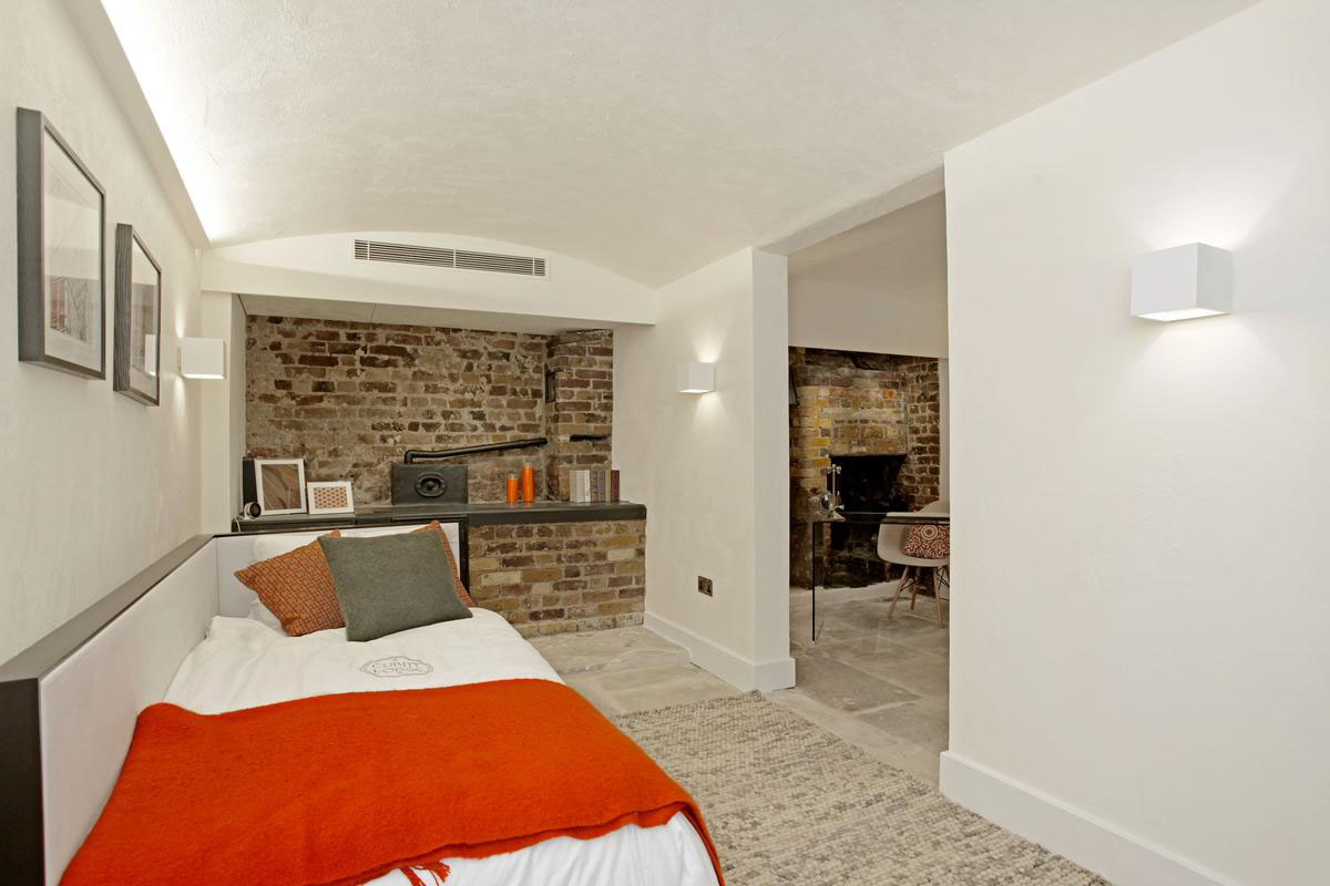 Modern Bedroom with Brick Wall