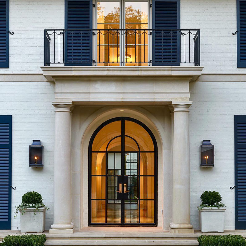 Classic front Entrance with Columns and Arched Steel and Glass Door