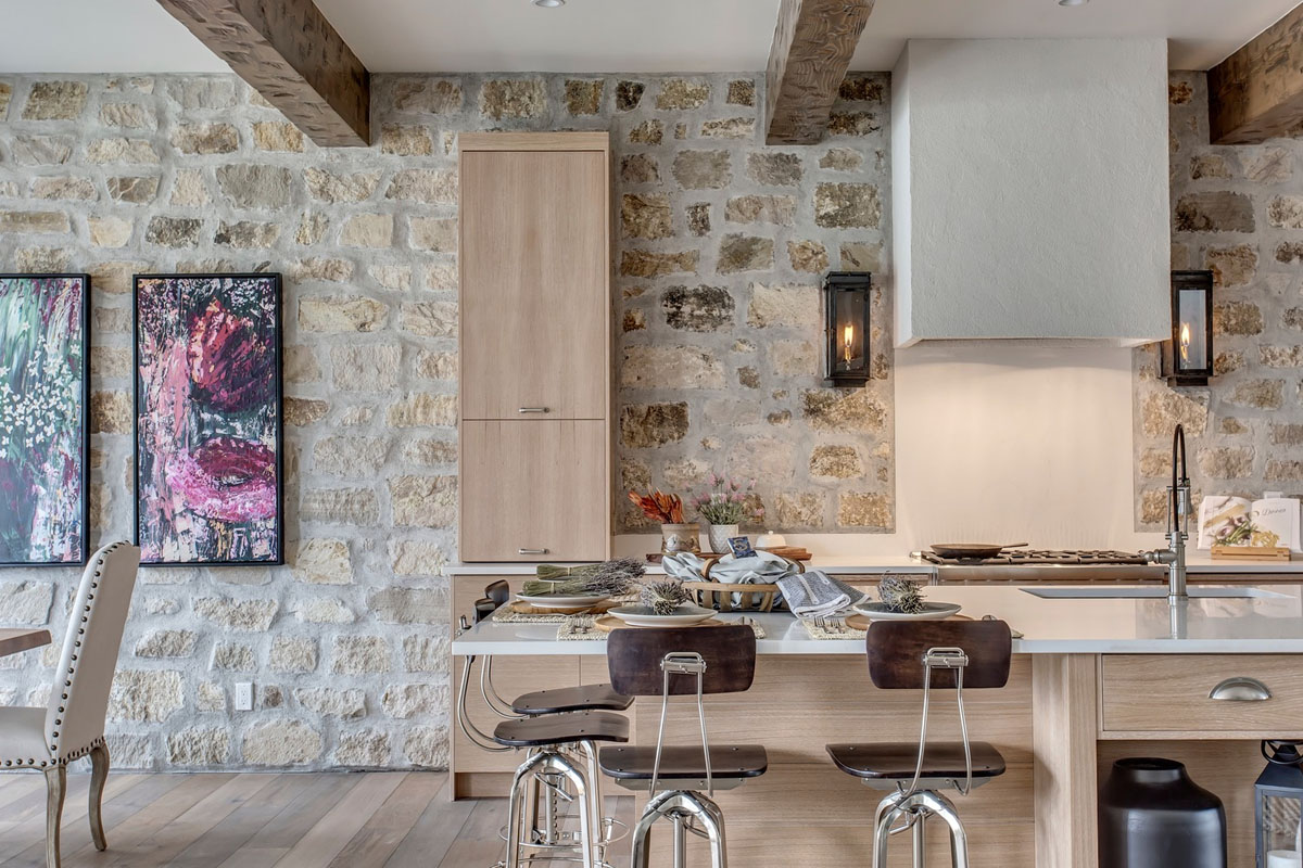 Elegant Modern Kitchen with Rustic Stone Walls and Ceiling Wood Beams