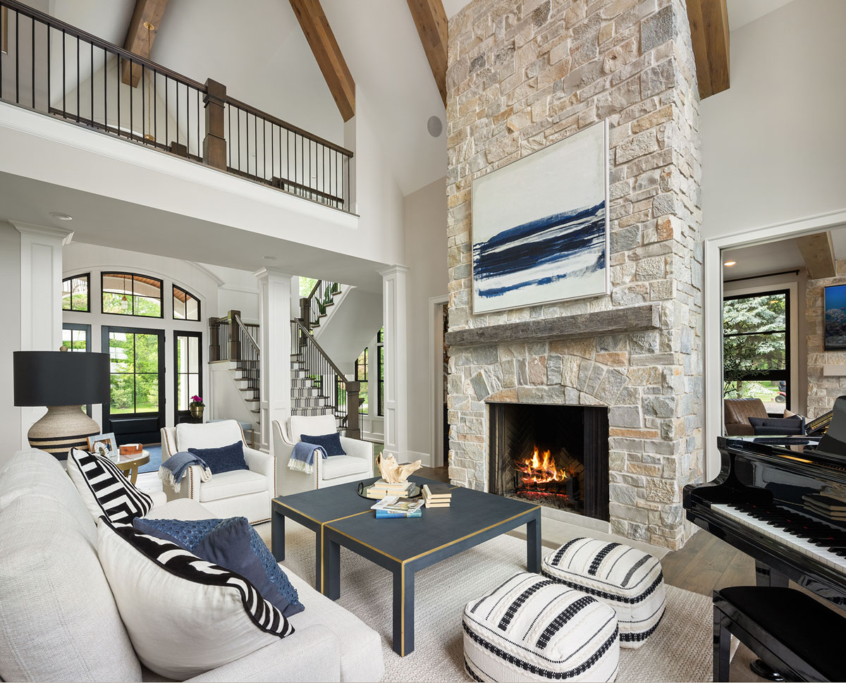 Living Room with Double Height Stone Fireplace