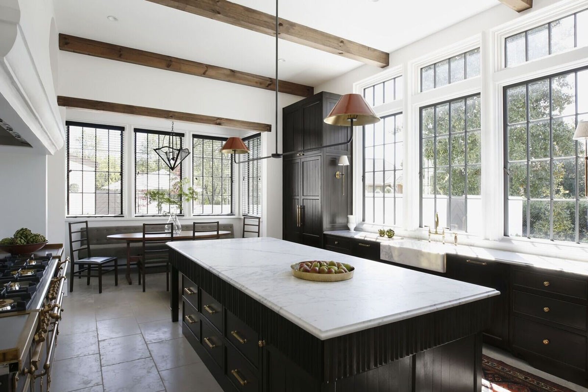 Neutral-Toned Kitchen with Wood Beams and Grey Limestone Floors