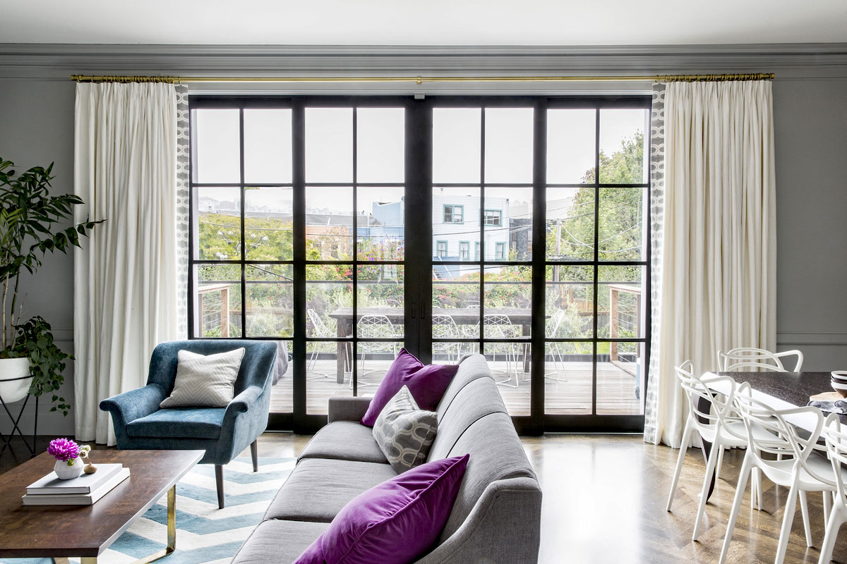 Transitional Living Room With Floor-To-Ceiling Windows