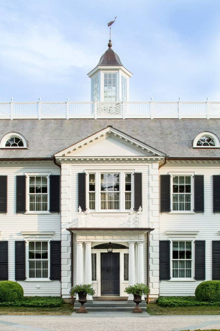 Federal Architecture with Cupola and Chippendale Style Railing