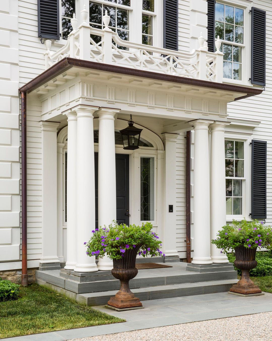 Classical Doric Portico Capped by a Chippendale Rail