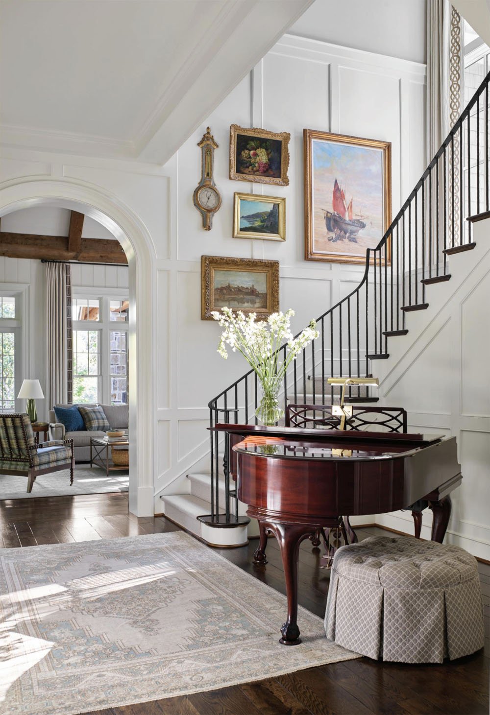 Stair Hall with Custom Millwork in a Classic Grid Pattern