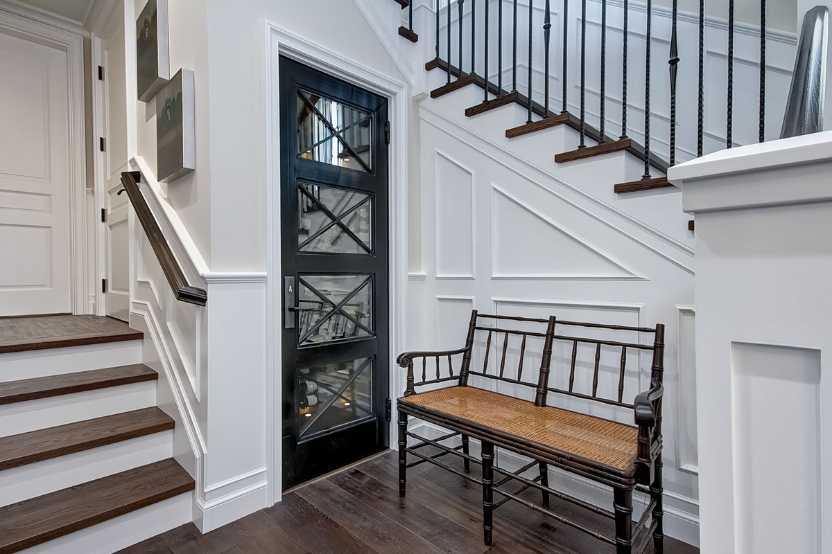 Temperature Controlled Glass Wine Closet Under the Stairs